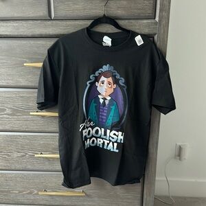 Disney Black “Haunted Mansion” themed tee shirt. 
Brand new never worn.Size L